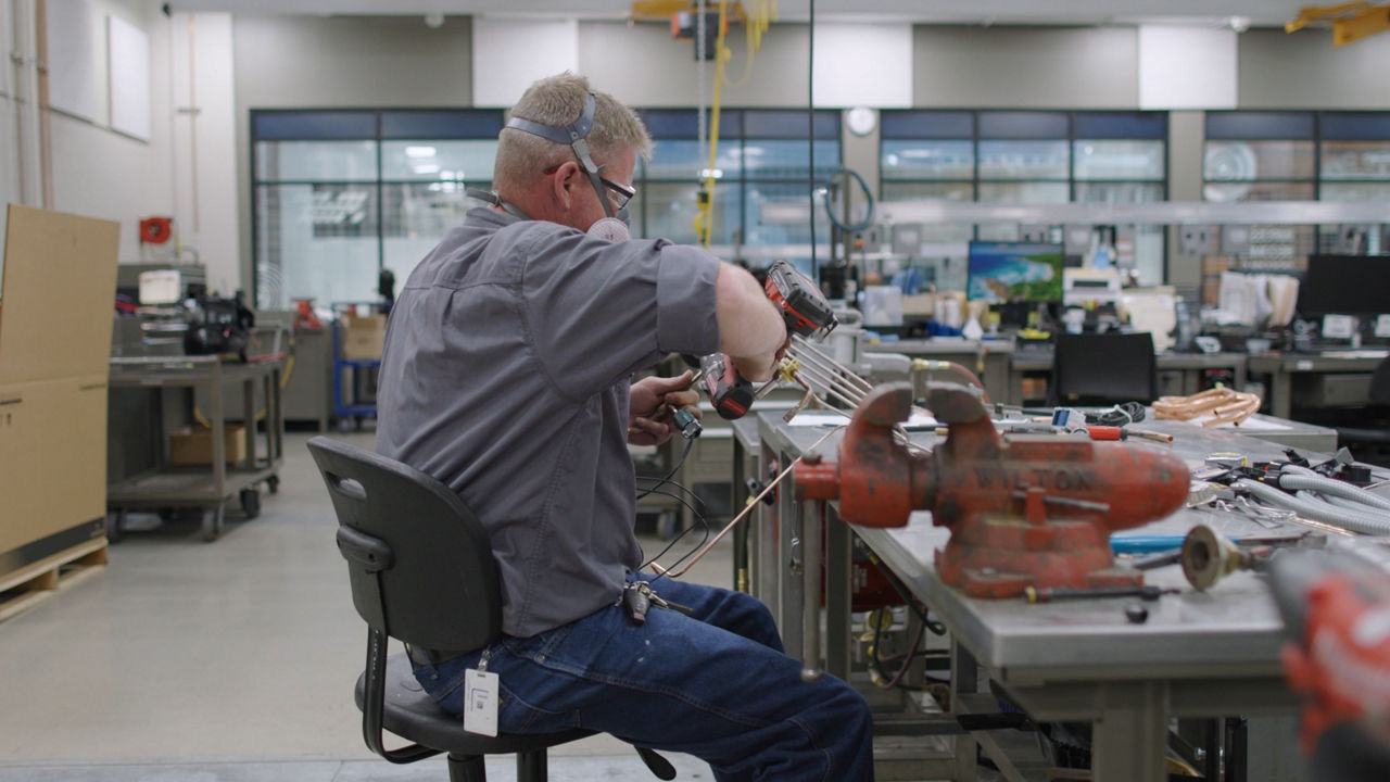 Copeland Worker with Tools