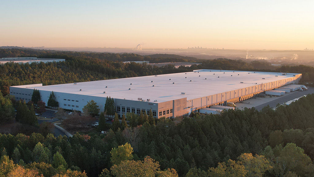 Birds eyes view of factory at sunset
